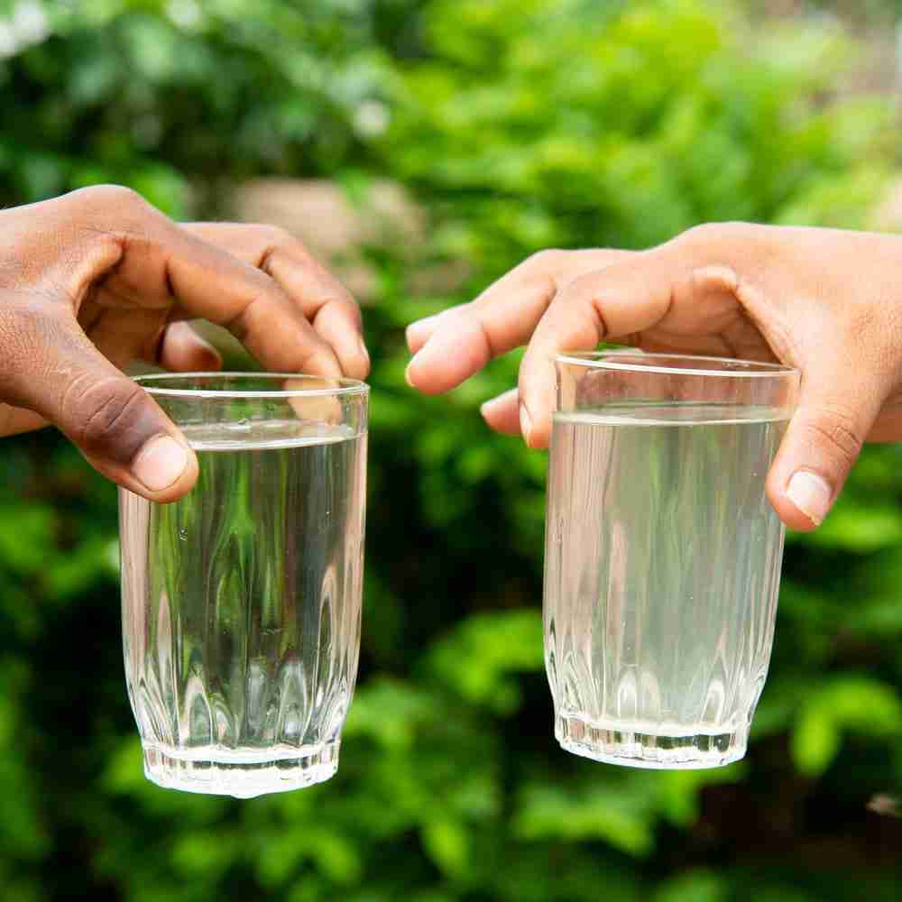 Comparing a glass full of clean water with a glass full of dirty water.