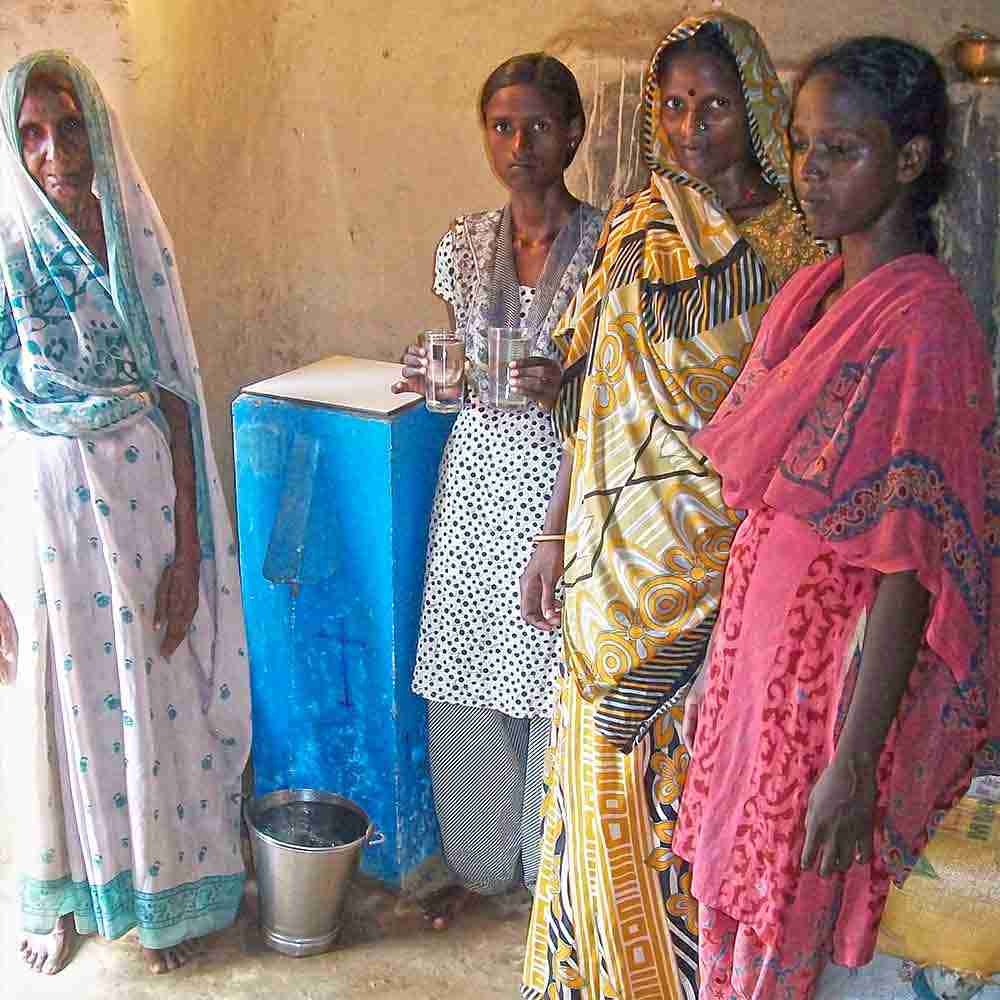 This family now enjoys clean drinking water through the BioSand Water Filter provided by GFA World, a Christian organization