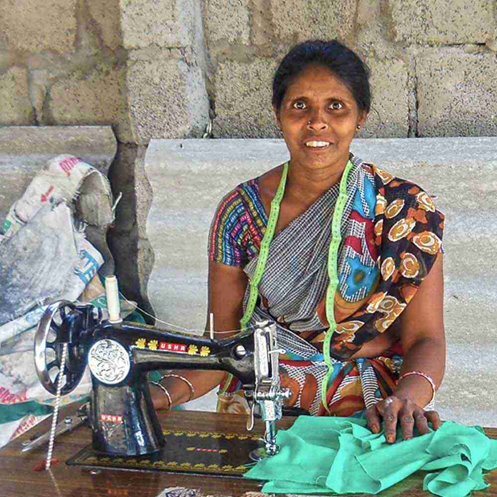 This 36-year-old widow who received a sewing machine through the GFA World Christmas Gift Distribution for widows