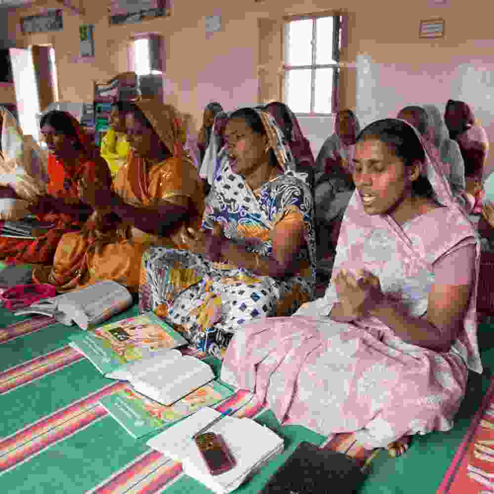 Women singing in GFA World adult literacy class
