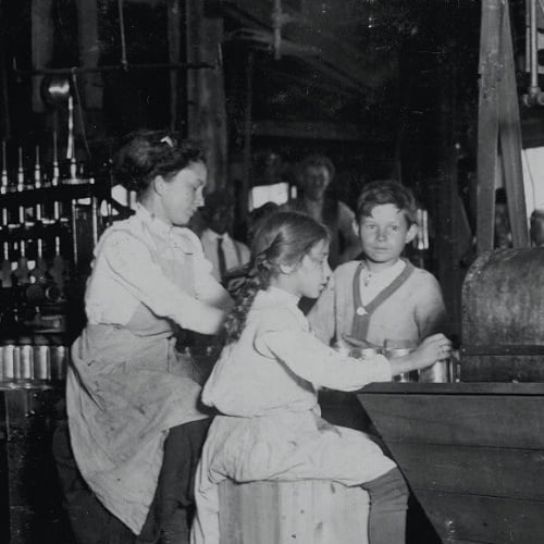 Young girl in child labor in a cannery factory in Delaware, U.S., in 1910