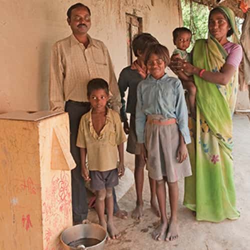 Sabin with his family received a GFA World Biosand Water Filter
