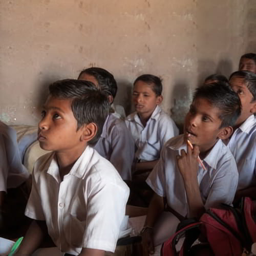 Children attentive in GFA World (Gospel for Asia) child sponsorship class