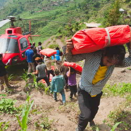 GFA World (Gospel for Asia) national missionary workers delivering relief to earthquake victims in Nepal in the mountains
