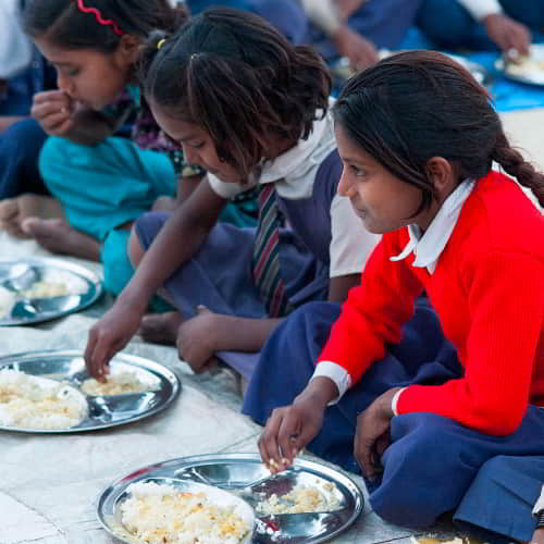 Children receive nutritious food through GFA World child sponsorship