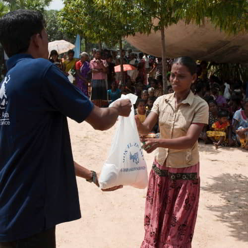 Woman received relief supplies through GFA World, a poverty organization