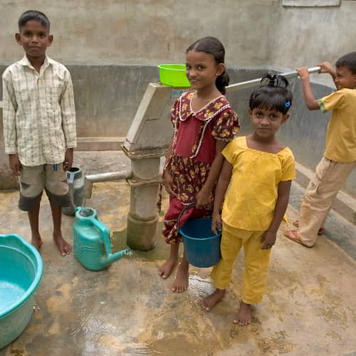 Children collecting clean water through GFA World Jesus Wells