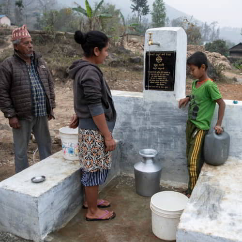 Family from Nepal enjoys clean water through GFA World Jesus Wells