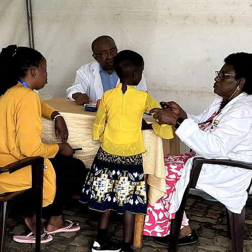 Mother and child patient visits GFA World medical camp in Rwanda Africa