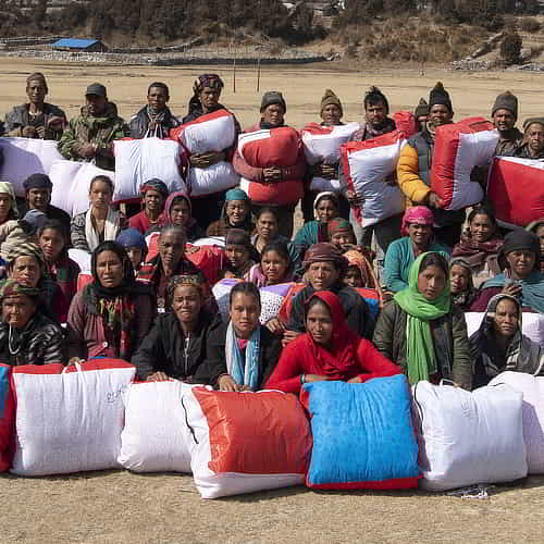 Village receives warm blankets through GFA World gift distribution