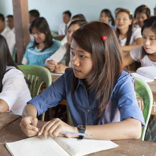 Young women studying in class