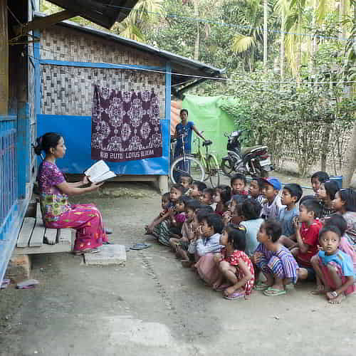 GFA World child sponsorship staff teaching children in Asia