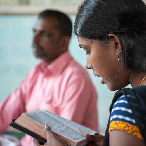 GFA World woman missionary reading out loud from God's Word