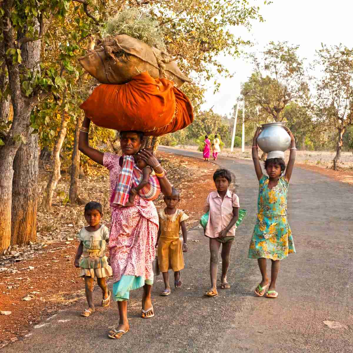 This mother and her five children are returning home from a ten-hour work day in the fields