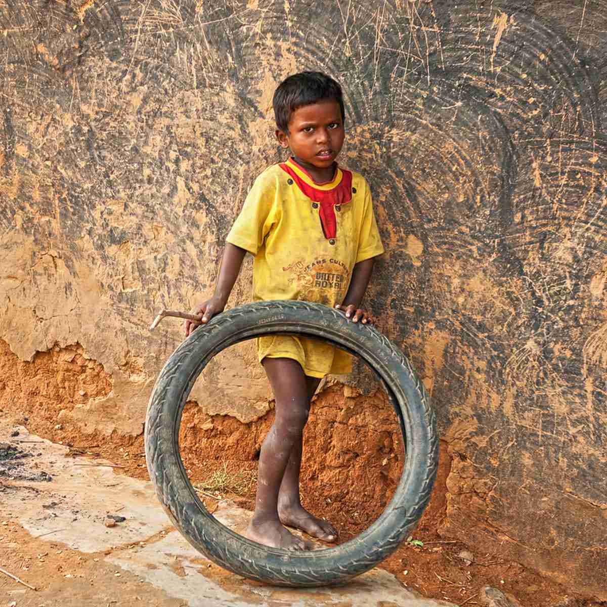 Many young children like this boy missed receiving an education due to poverty