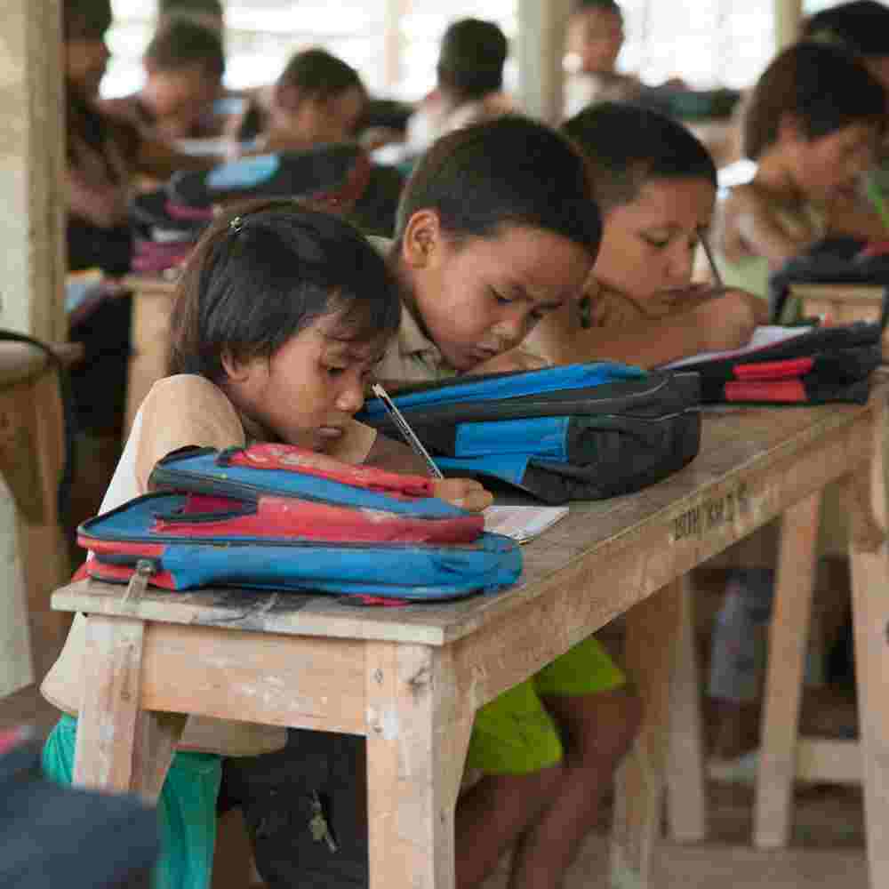 Children studying hard in Bridge of Hope center