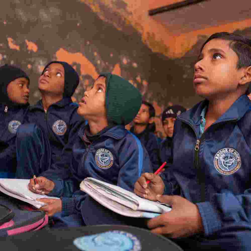 Children paying attention in GFA World child sponsorship program class