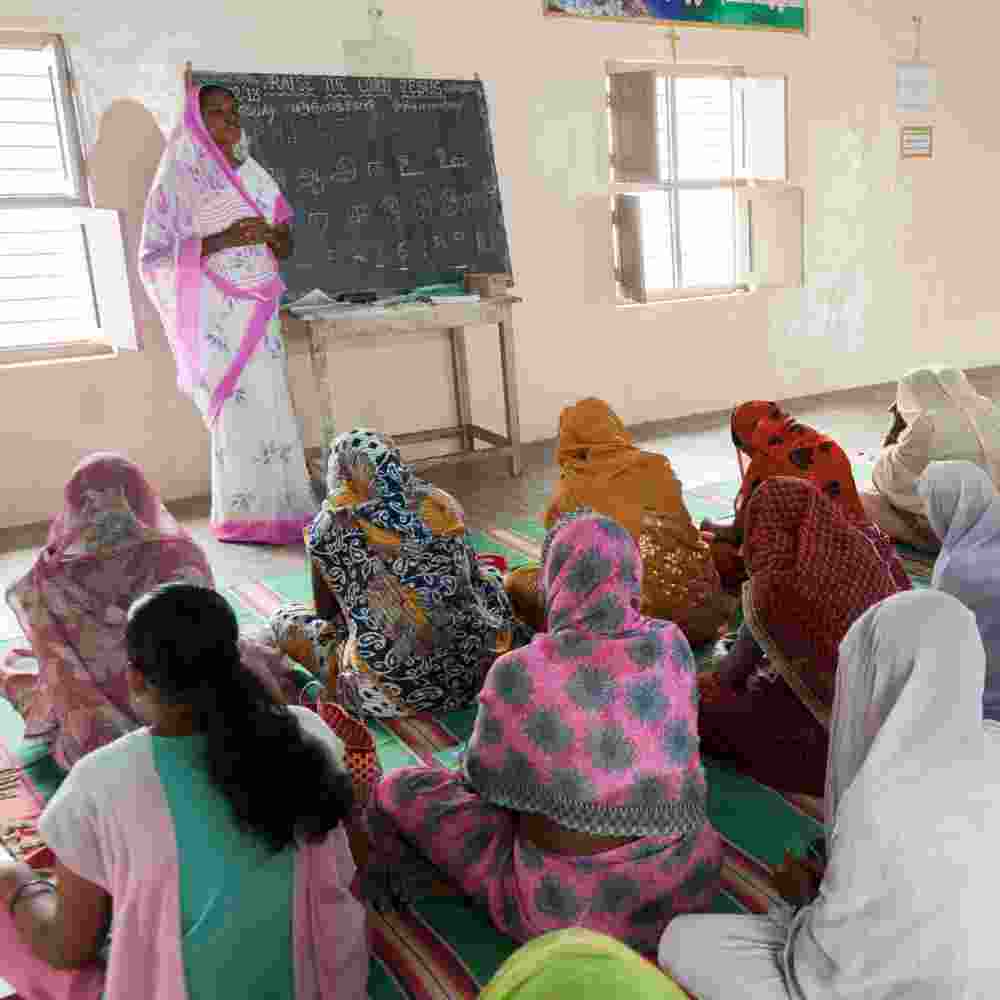 GFA World woman missionary teaches literacy class