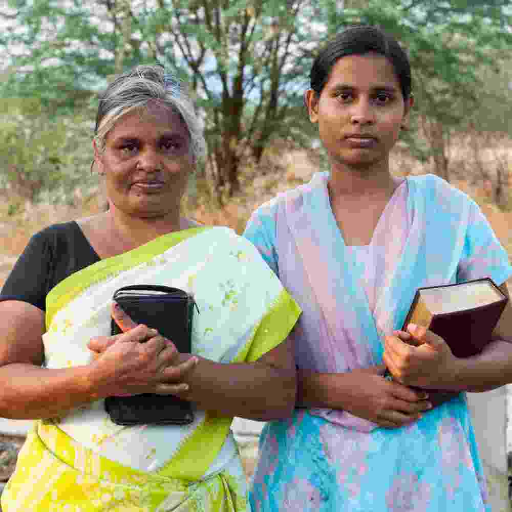 Women holding their Bibles