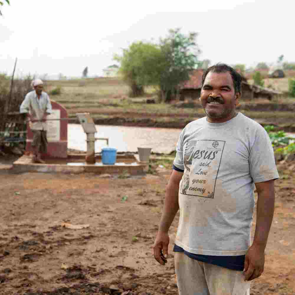 Vimal and the Jesus Well installed in his village