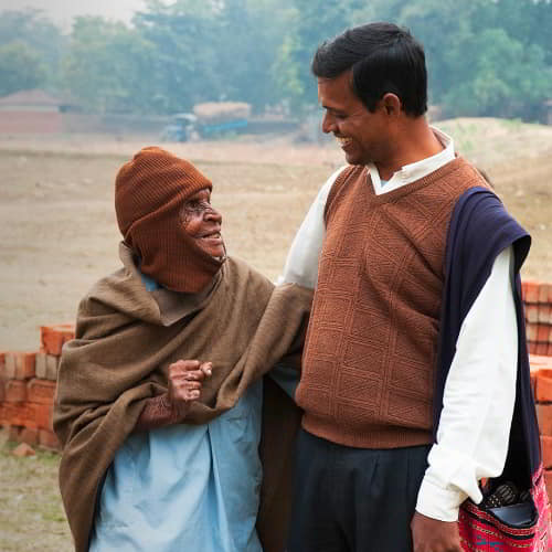 GFA World (Gospel for Asia) national missionary worker sharing God's love to a leprosy patient