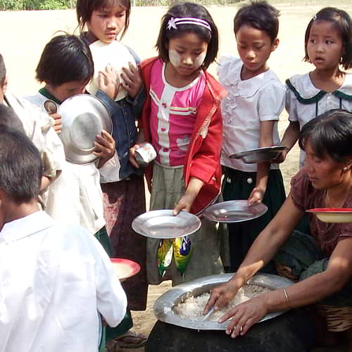Children from Myanmar enjoying nutritious food through GFA World child sponsorship program