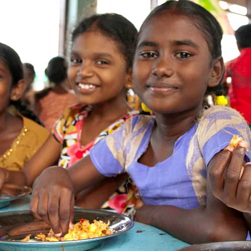 Children in poverty enjoy education and nutritious food through GFA World's Child Sponsorship Program