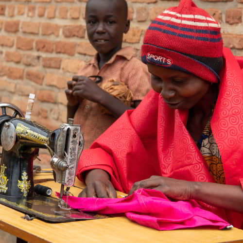 GFA World is one of many organizations that help poverty through income generating gifts like sewing machines