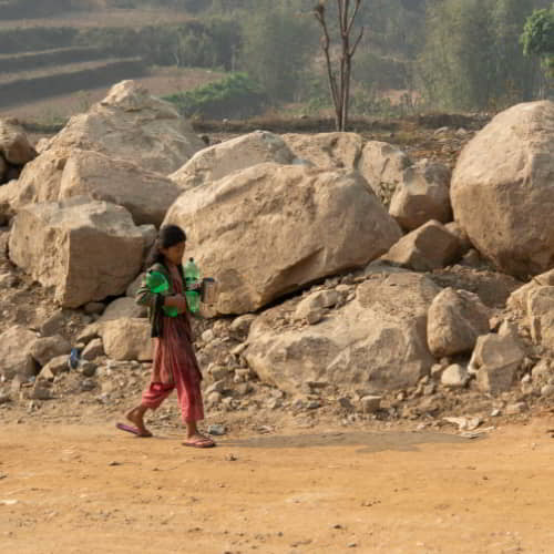 Women and girls in poverty travel long distances to acquire water from unsafe sources