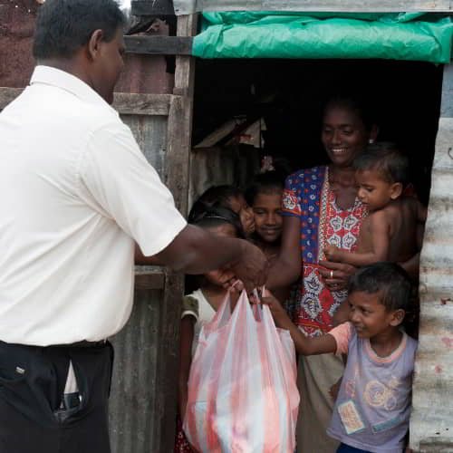 Family in poverty from Sri Lanka receives food relief from GFA World gift distribution