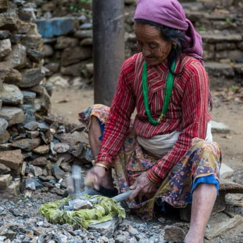 Elderly woman from Nepal living in poverty