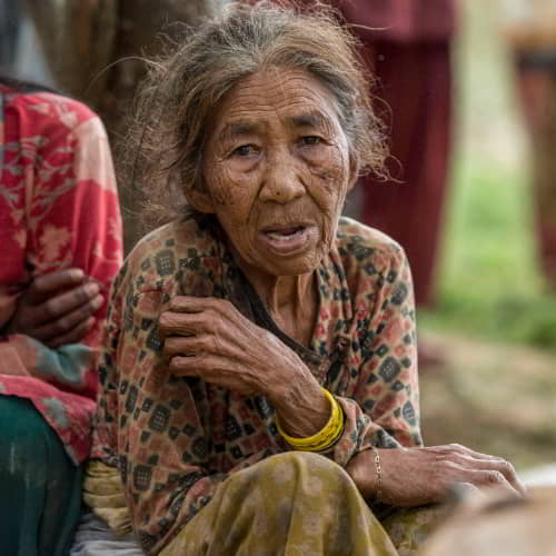 Elderly women from Nepal in poverty