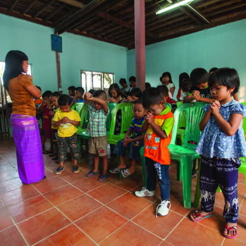 Children praying at GFA World (Gospel for Asia) child sponsorship program