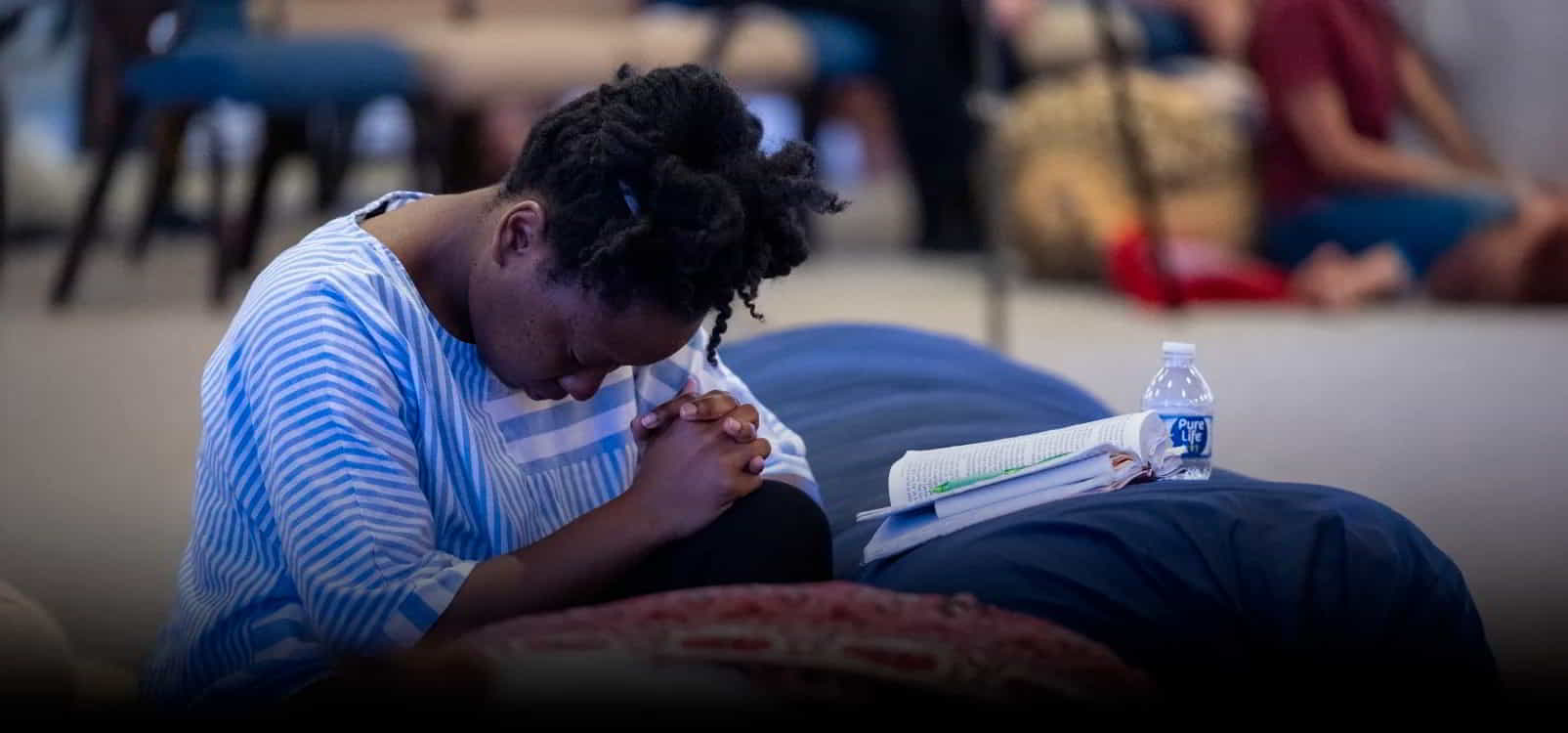 Woman praying in GFA World's Set Apart